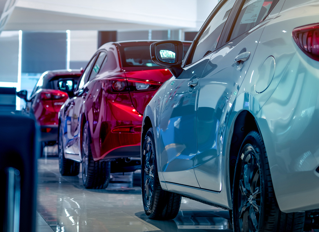 Business Insurance - Close-up of Luxury Cars in a Dealership